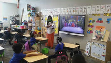 Load and play video in Gallery viewer, video of teacher using career exploration flash cards and letting students know what they can be when they grow up 
